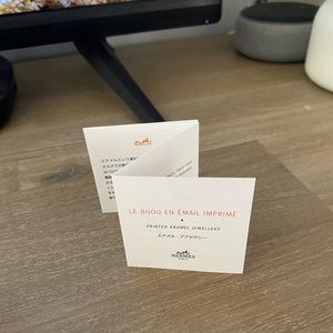 Hermès skinny printed gold enamel bangle